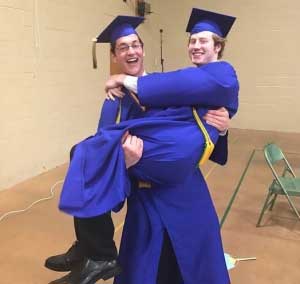 hugging palcs graduates